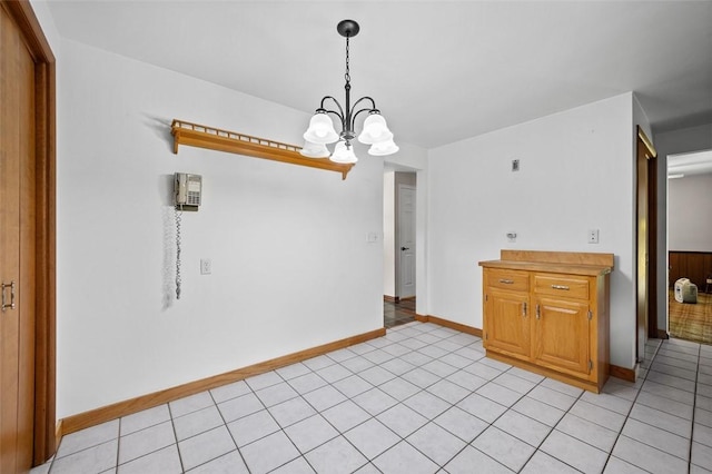 4032 Sardis Rd, Murrysville, PA 15668 - unfurnished dining area featuring a chandelier and light tile patterned floors