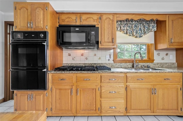 4032 Sardis Rd, Murrysville, PA 15668 - kitchen featuring black appliances, light stone countertops, light tile patterned floors, decorative backsplash, and brown cabinets