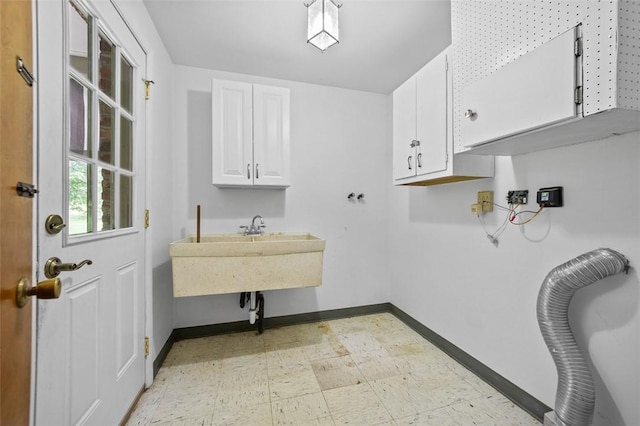 4032 Sardis Rd, Murrysville, PA 15668 - laundry area with cabinet space and light floors
