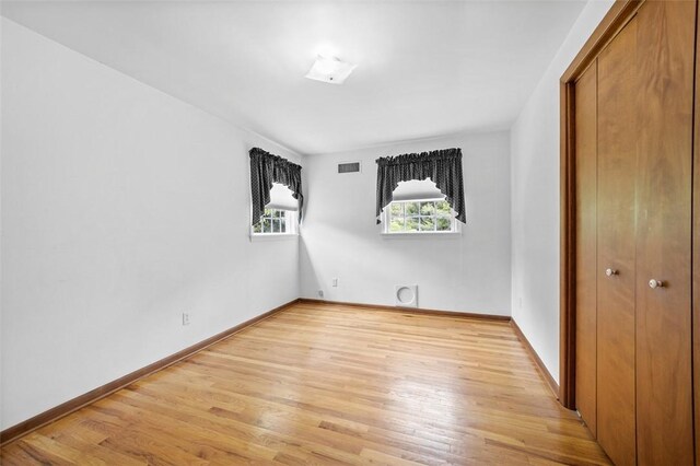 4032 Sardis Rd, Murrysville, PA 15668 - unfurnished bedroom featuring light wood finished floors and a closet