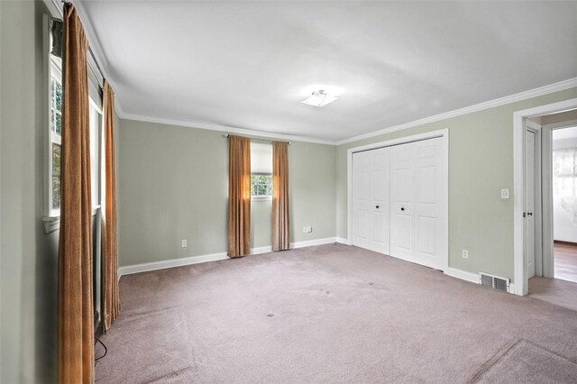 4032 Sardis Rd, Murrysville, PA 15668 - unfurnished bedroom featuring ornamental molding, carpet floors, and a closet