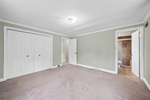 4032 Sardis Rd, Murrysville, PA 15668 - unfurnished bedroom with ornamental molding, carpet floors, a closet, and ensuite bathroom