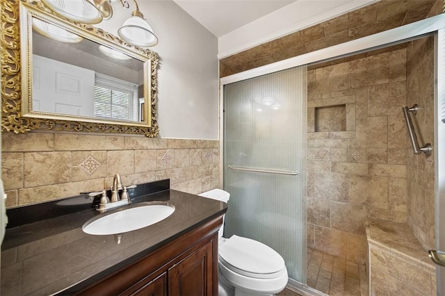 4032 Sardis Rd, Murrysville, PA 15668 - bathroom with tile walls, a shower stall, vanity, and a wainscoted wall