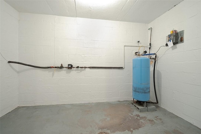 4032 Sardis Rd, Murrysville, PA 15668 - below grade area with a water pressure tank and concrete block wall