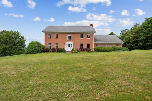 616 Edwards, Derry Twp, PA 15650 - view of front of house featuring a chimney and a front lawn