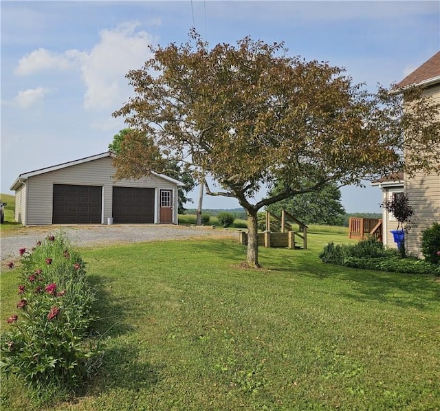 169 Fergus Rd, Slippery Rock Twp But, PA 16057 - view of grassy yard featuring a detached garage and an outbuilding