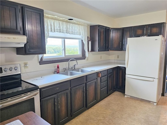 169 Fergus Rd, Slippery Rock Twp But, PA 16057 - kitchen with freestanding refrigerator, stainless steel electric range oven, under cabinet range hood, and light countertops