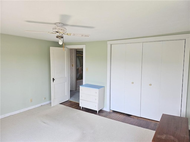 169 Fergus Rd, Slippery Rock Twp But, PA 16057 - unfurnished bedroom with a closet, a ceiling fan, and dark wood-type flooring
