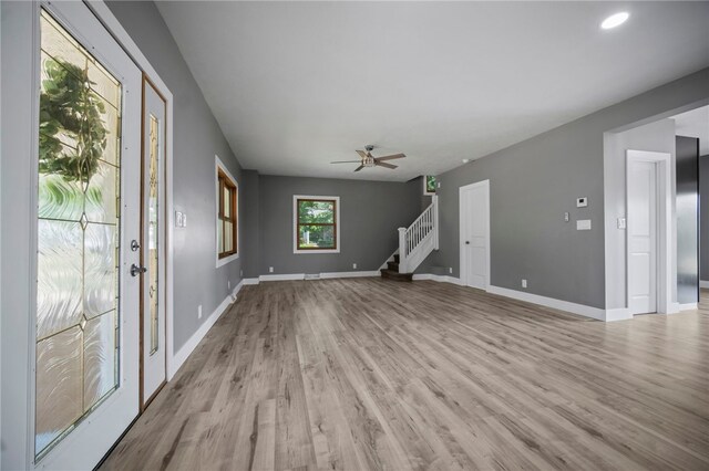 736 Shenango Stop Rd, Shenango Twp Law, PA 16101 - unfurnished living room featuring stairway, light wood-style floors, ceiling fan, and recessed lighting