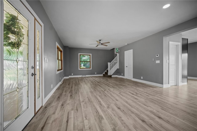 736 Shenango Stop Rd, Shenango Twp Law, PA 16101 - unfurnished living room featuring light wood finished floors, stairs, ceiling fan, and recessed lighting