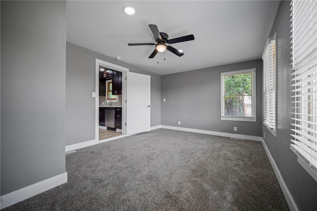 736 Shenango Stop Rd, Shenango Twp Law, PA 16101 - unfurnished bedroom featuring carpet floors, a ceiling fan, and connected bathroom