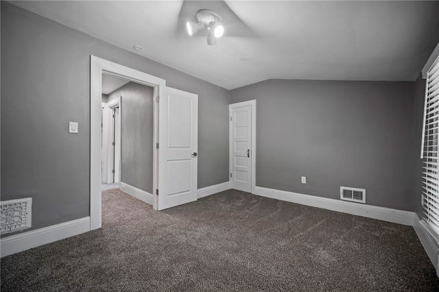 736 Shenango Stop Rd, Shenango Twp Law, PA 16101 - unfurnished bedroom with dark carpet and vaulted ceiling