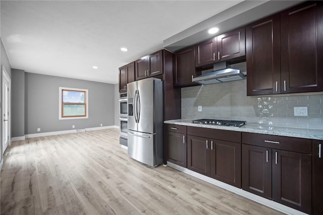 736 Shenango Stop Rd, Shenango Twp Law, PA 16101 - kitchen with stainless steel appliances, exhaust hood, backsplash, light wood-style flooring, and recessed lighting