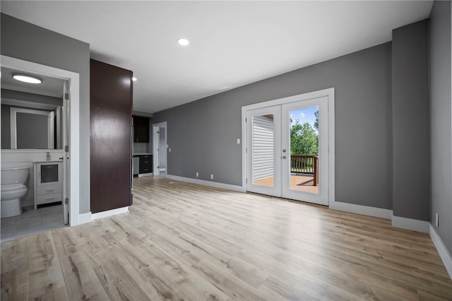 736 Shenango Stop Rd, Shenango Twp Law, PA 16101 - unfurnished living room with light wood-type flooring, french doors, and recessed lighting