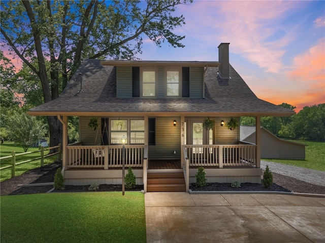 736 Shenango Stop Rd, Shenango Twp Law, PA 16101 - farmhouse-style home with covered porch, a chimney, and roof with shingles