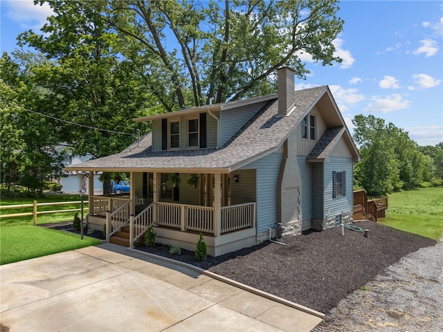 736 Shenango Stop Rd, Shenango Twp Law, PA 16101 - view of front of property with covered porch, a shingled roof, a chimney, a front yard, and gravel driveway