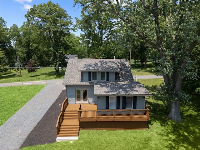736 Shenango Stop Rd, Shenango Twp Law, PA 16101 - rear view of property with french doors, a shingled roof, gravel driveway, a yard, and view of scattered trees