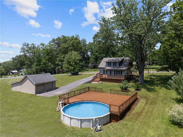 736 Shenango Stop Rd, Shenango Twp Law, PA 16101 - swimming pool featuring a wooden deck, an outbuilding, a lawn, and view of scattered trees