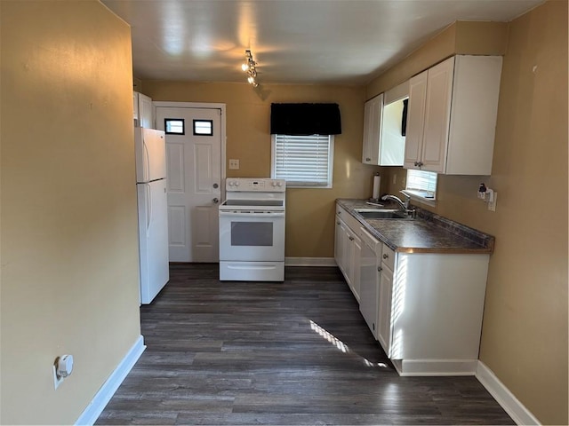 10 Crest St, Uniontown, PA 15401 - kitchen with white appliances, white cabinetry, dark wood-style flooring, and dark countertops