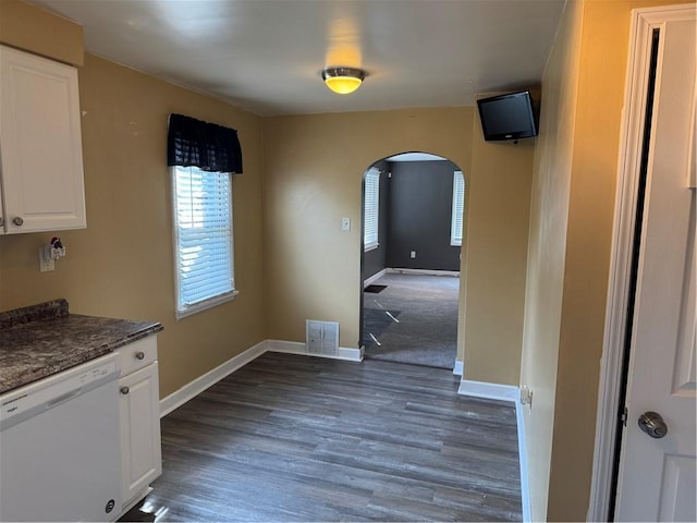 10 Crest St, Uniontown, PA 15401 - unfurnished dining area with arched walkways and dark wood finished floors