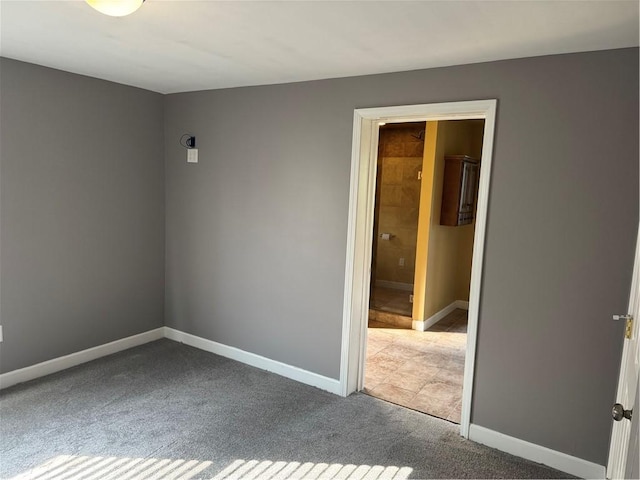 10 Crest St, Uniontown, PA 15401 - carpeted spare room with baseboards