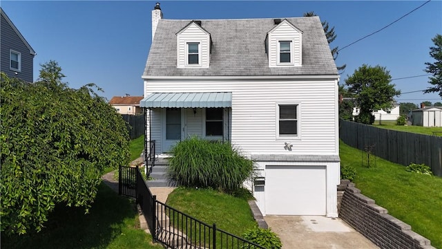 511 Oakhurst Ave N, Versailles, PA 15137 - view of front facade with an attached garage, concrete driveway, and a shingled roof