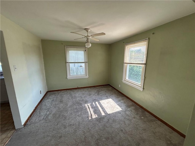 511 Oakhurst Ave N, Versailles, PA 15137 - carpeted spare room featuring healthy amount of natural light and a ceiling fan