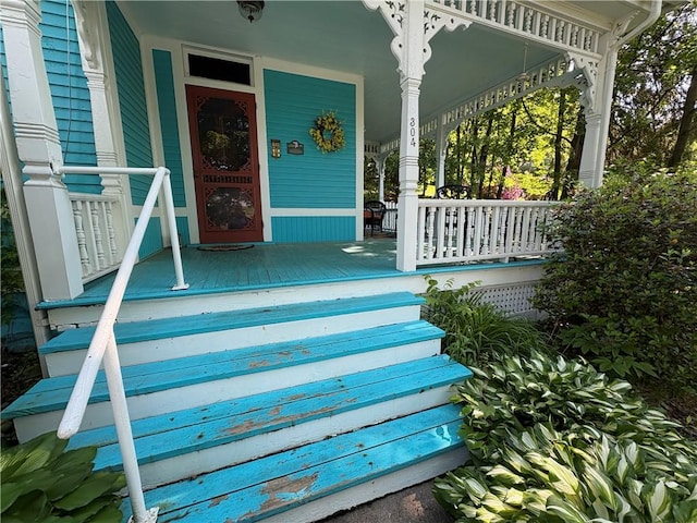 304 Jefferson St, Brookville Area School District, PA 15825 - view of exterior entry featuring a porch and a metal roof