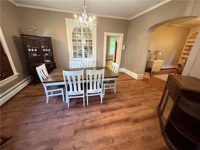 304 Jefferson St, Brookville Area School District, PA 15825 - dining area featuring arched walkways, wood finished floors, a baseboard radiator, a chandelier, and ornamental molding