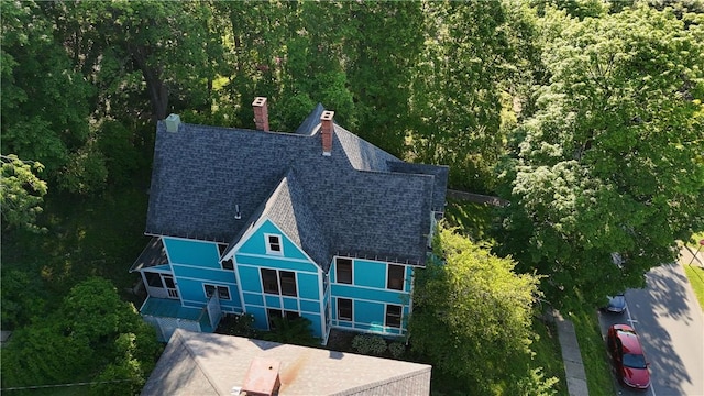 304 Jefferson St, Brookville Area School District, PA 15825 - aerial view of property and surrounding area featuring a heavily wooded area