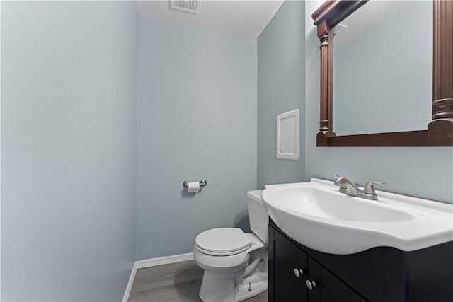 320 Penn Lear Ct, Monroeville, PA 15146 - half bathroom featuring vanity and wood finished floors