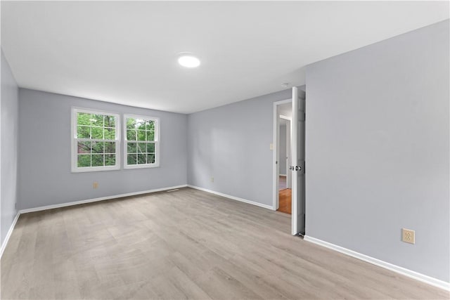 320 Penn Lear Ct, Monroeville, PA 15146 - spare room with baseboards and wood finished floors