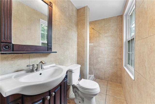 320 Penn Lear Ct, Monroeville, PA 15146 - full bath with tile walls, tiled shower, vanity, and tile patterned flooring