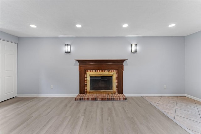 320 Penn Lear Ct, Monroeville, PA 15146 - unfurnished living room featuring a fireplace, wood finished floors, and recessed lighting