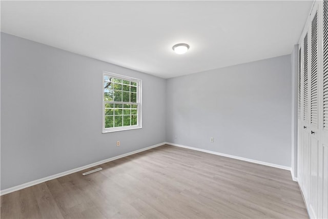 320 Penn Lear Ct, Monroeville, PA 15146 - unfurnished bedroom featuring a closet and wood finished floors