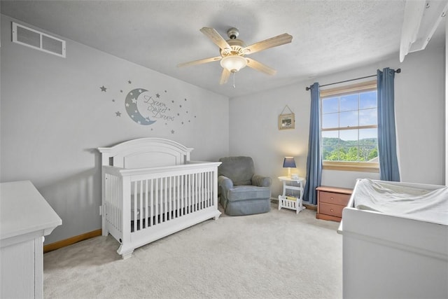 3004 Woodfield Dr, Hopewell Twp Bea, PA 15001 - bedroom with light carpet, a crib, and a ceiling fan