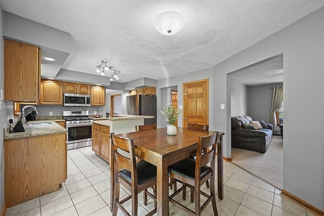 3004 Woodfield Dr, Hopewell Twp Bea, PA 15001 - dining space featuring light tile patterned floors and light colored carpet