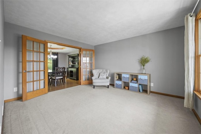 3004 Woodfield Dr, Hopewell Twp Bea, PA 15001 - sitting room featuring carpet flooring, a chandelier, and french doors