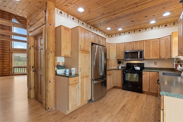 1155 Sarver Rd, South Buffalo Twp, PA 16055 - kitchen with appliances with stainless steel finishes, rustic walls, dark countertops, wooden ceiling, and light wood-type flooring