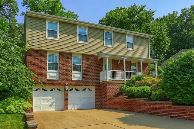 217 Baintree Rd, Moon/Crescent Twp, PA 15108 - view of front of property with an attached garage, driveway, and brick siding
