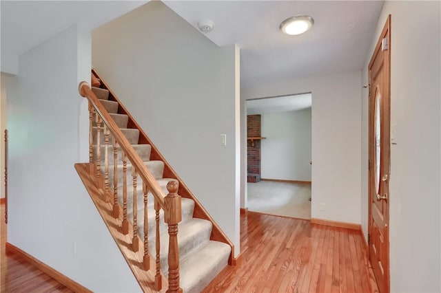 217 Baintree Rd, Moon/Crescent Twp, PA 15108 - stairs with wood-type flooring and baseboards