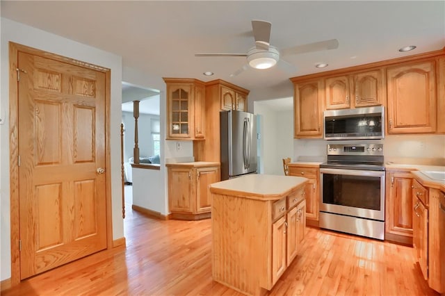 217 Baintree Rd, Moon/Crescent Twp, PA 15108 - kitchen featuring stainless steel appliances, light countertops, light wood-type flooring, a center island, and recessed lighting