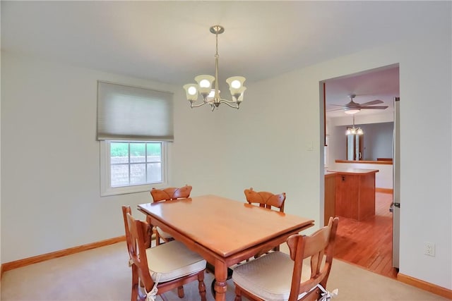 217 Baintree Rd, Moon/Crescent Twp, PA 15108 - dining space featuring a chandelier and baseboards