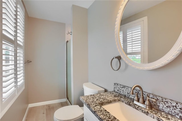 217 Baintree Rd, Moon/Crescent Twp, PA 15108 - bathroom featuring a shower with shower door, vanity, and wood finished floors