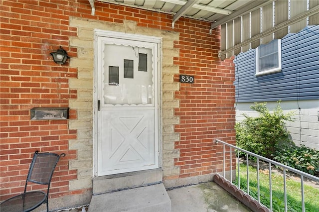 830 Dunster St, Brookline, PA 15226 - doorway to property featuring brick siding