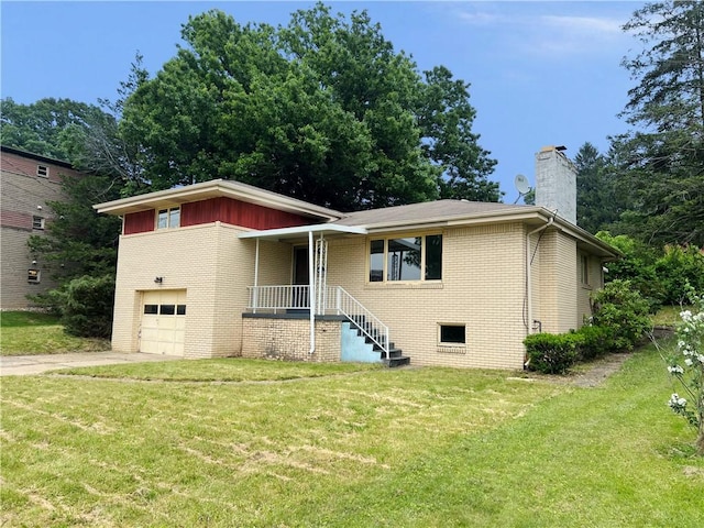131 Monica Dr, Hempfield Twp Wml, PA 15601 - view of front of house with brick siding, a chimney, a front lawn, and an attached garage
