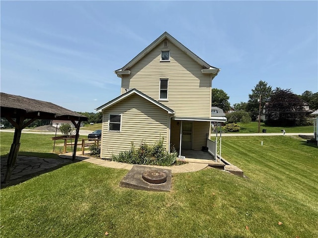 102 Bayard Ave, Dry Tav/Rices Landing, PA 15357 - rear view of property featuring a yard
