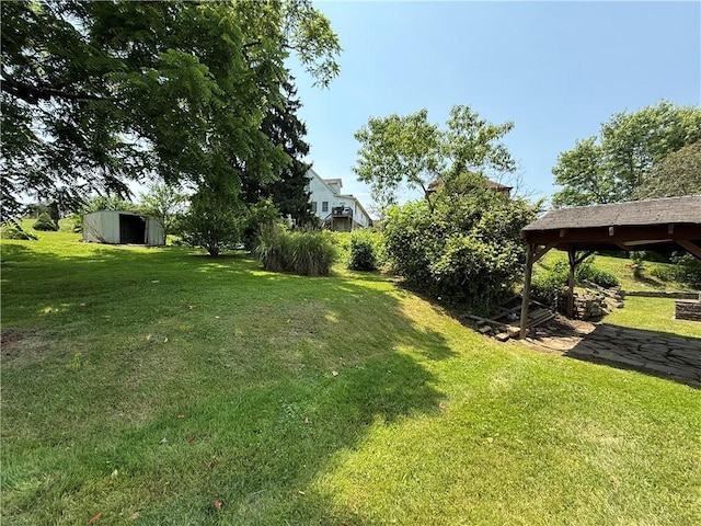 102 Bayard Ave, Dry Tav/Rices Landing, PA 15357 - view of grassy yard with a storage unit
