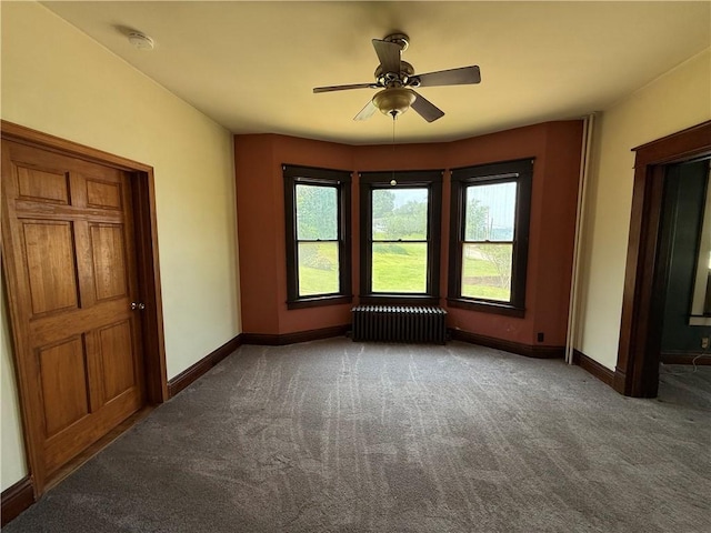 102 Bayard Ave, Dry Tav/Rices Landing, PA 15357 - carpeted empty room with radiator, a smoke detector, and ceiling fan