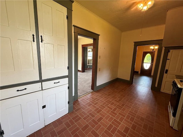 102 Bayard Ave, Dry Tav/Rices Landing, PA 15357 - hallway with brick patterned floors, a chandelier, and crown molding
